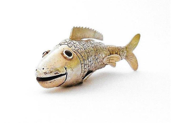 Late 19th century Chinese articulated fish partly gilt with red glass eyes