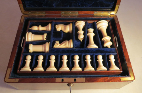 White ivory Staunton chessmen in specially made blue velvet plush lined tray