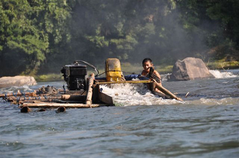Gold dredger on Malikha River