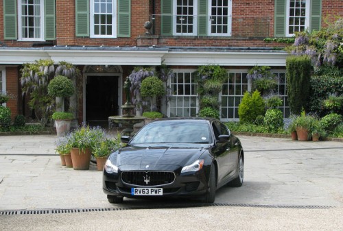 Maserati Quattroporte in front of Chewton Glen