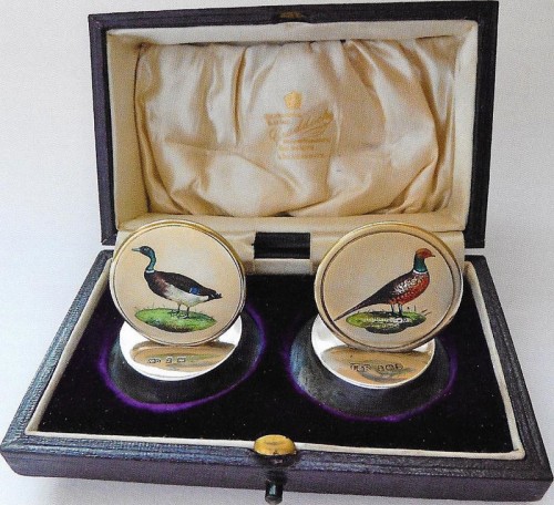 Two Edwardian beautifully painted enamelled place card holders depicting a cock pheasant and mallard drake by Levi and Salomon of Birmingham 1908