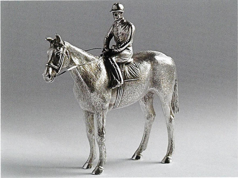 A Rare Victorian cast Pepper modelled as a jockey, probably Fred Archer on horseback by William and John Barnard 1882