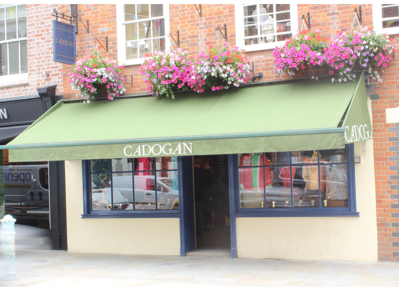 exterior of Cadogan & Co with summer hanging baskets