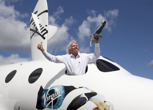 Sir Richard Branson in Spaceshiptwo Holding Model of Launcherone